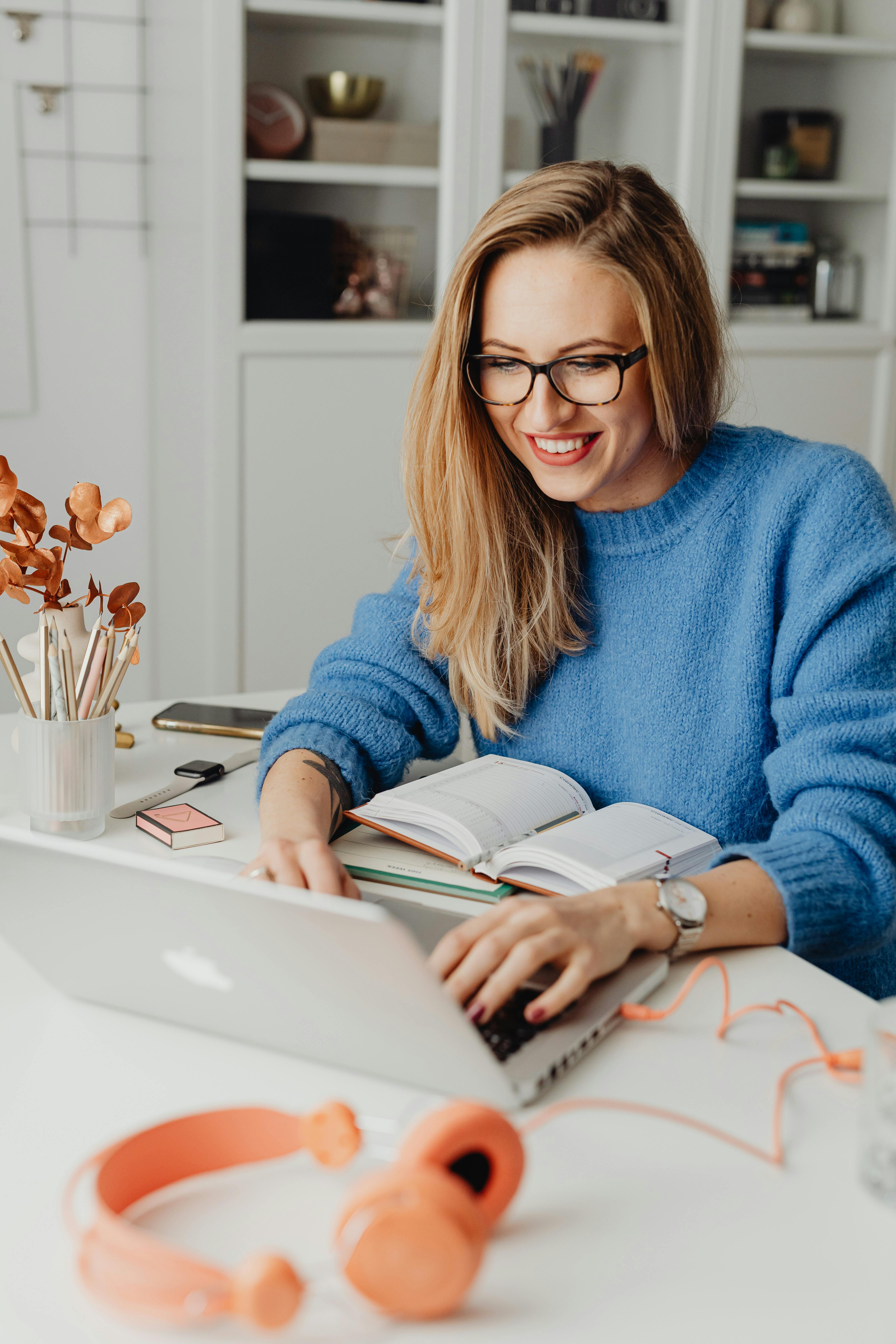 Photo by Photo By: Kaboompics.com: https://www.pexels.com/photo/a-woman-wearing-eyeglasses-using-laptop-5908728/