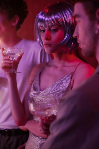 Photo by cottonbro studio: https://www.pexels.com/photo/woman-in-white-lace-tank-top-holding-clear-wine-glass-5020363/