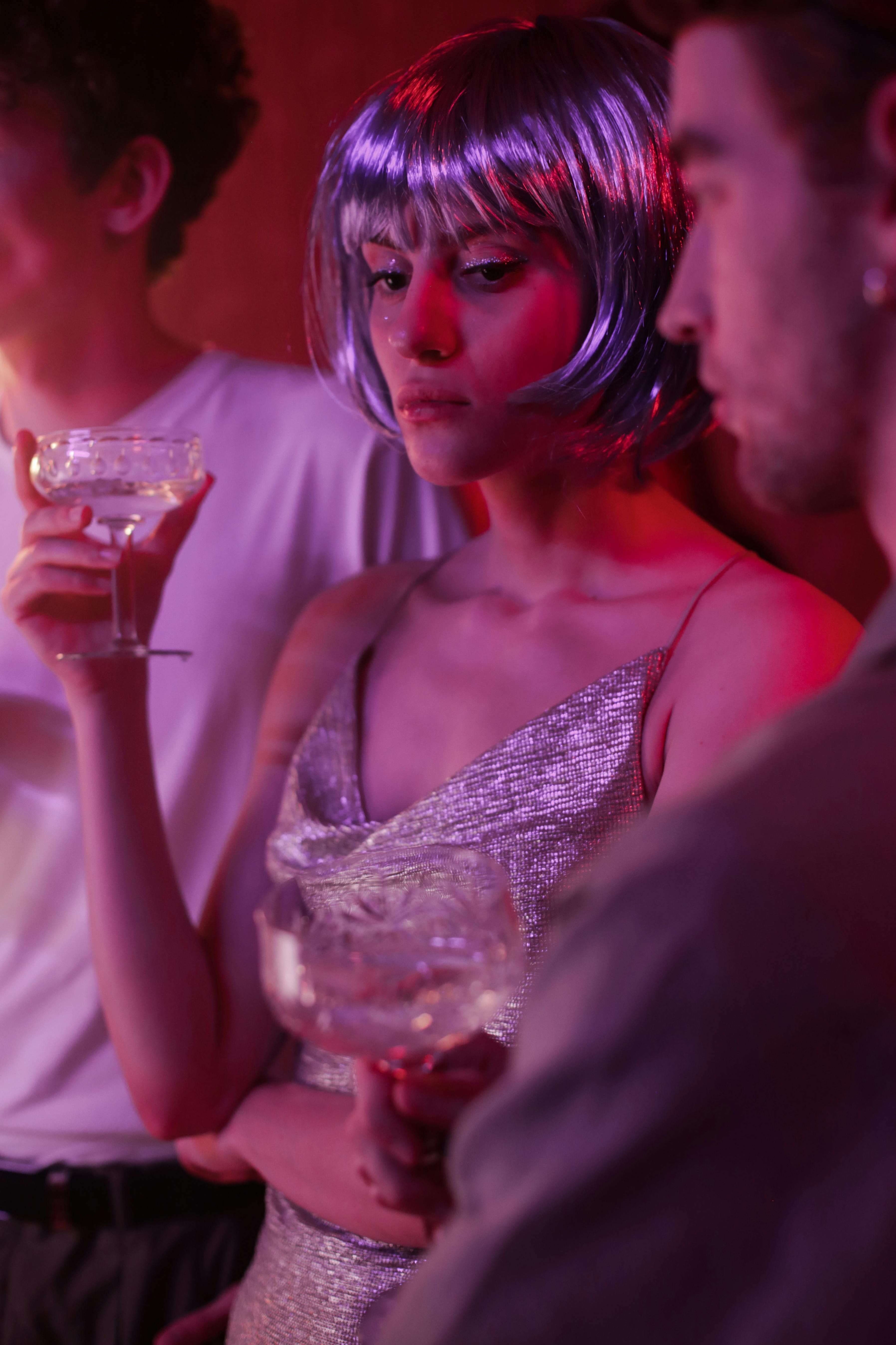 Photo by cottonbro studio: https://www.pexels.com/photo/woman-in-white-lace-tank-top-holding-clear-wine-glass-5020363/