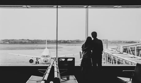 Photo by Cheng Shi Song: https://www.pexels.com/photo/back-view-of-couple-embracing-at-airport-21235995/