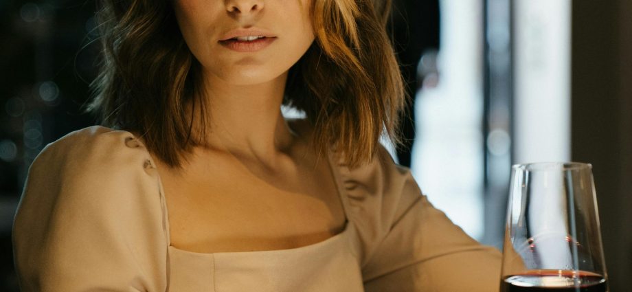 Photo by cottonbro studio: https://www.pexels.com/photo/woman-in-brown-long-sleeve-shirt-holding-wine-glass-4691215/