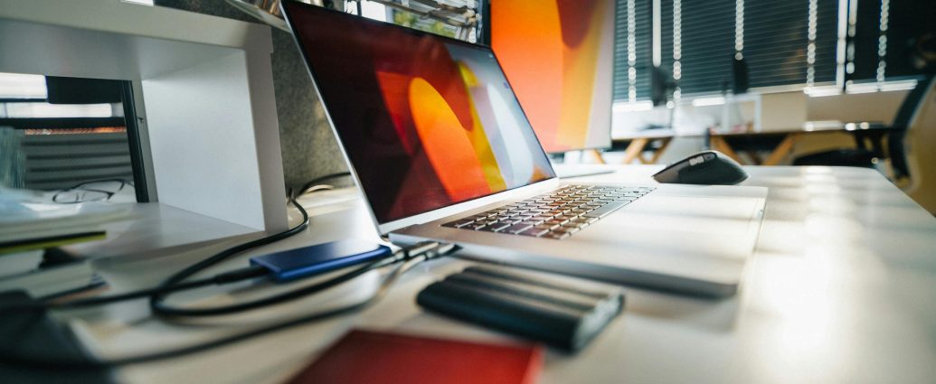 Photo by Jakub Zerdzicki: https://www.pexels.com/photo/modern-office-workspace-with-laptop-and-external-drives-29238152/