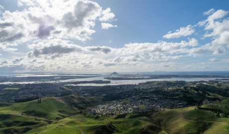 Photo by Ollie Craig: https://www.pexels.com/photo/city-on-hills-with-lakes-17982626/